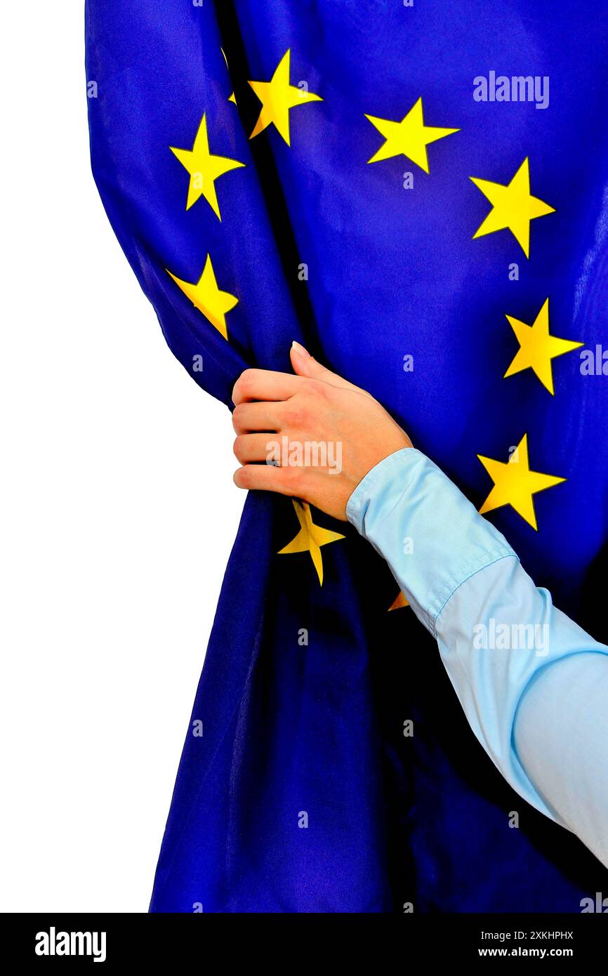 Vorhang auf für das EU Kasperltheater, Europäische Union, Frauen Hand rechts Stockfoto