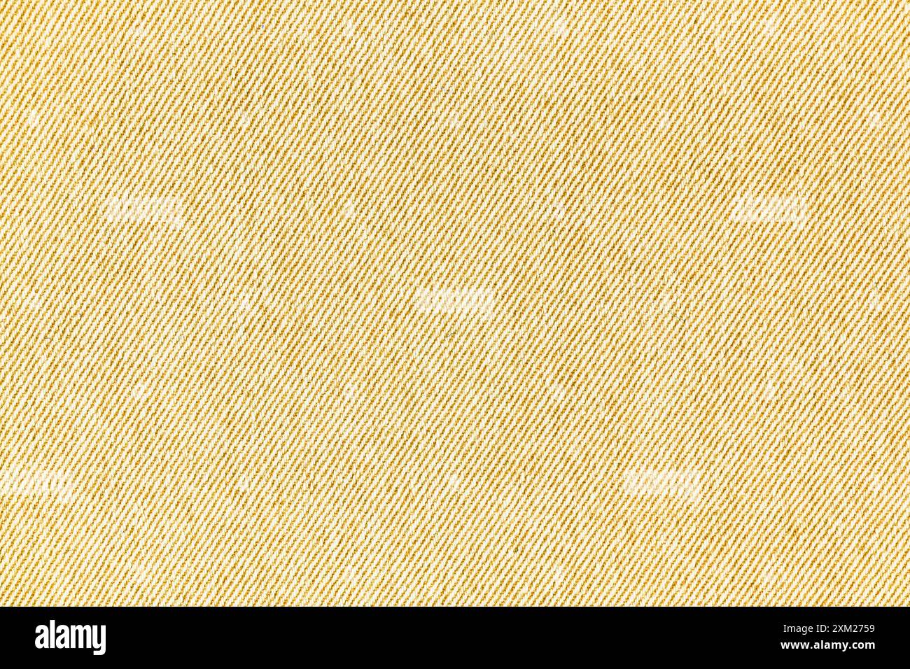 Nahaufnahme, Makro aus gelbem Jeans-Stoff Textur Hintergrund. Diagonalwebstoff, Leinwand. Textil für Dekor, Polster, Kleidung. Hintergrundbild Stockfoto