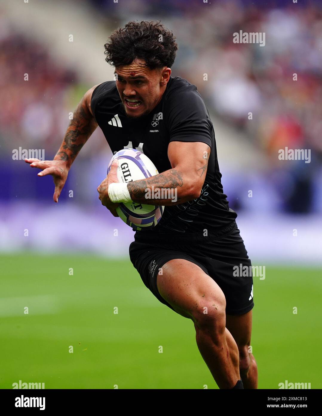 Der Neuseeländer Leo Moses während des Rugby-Sivens-Spiels gegen Argentinien im Stade de France am ersten Tag der Olympischen Spiele 2024 in Frankreich. Bilddatum: Samstag, 27. Juli 2024. Stockfoto