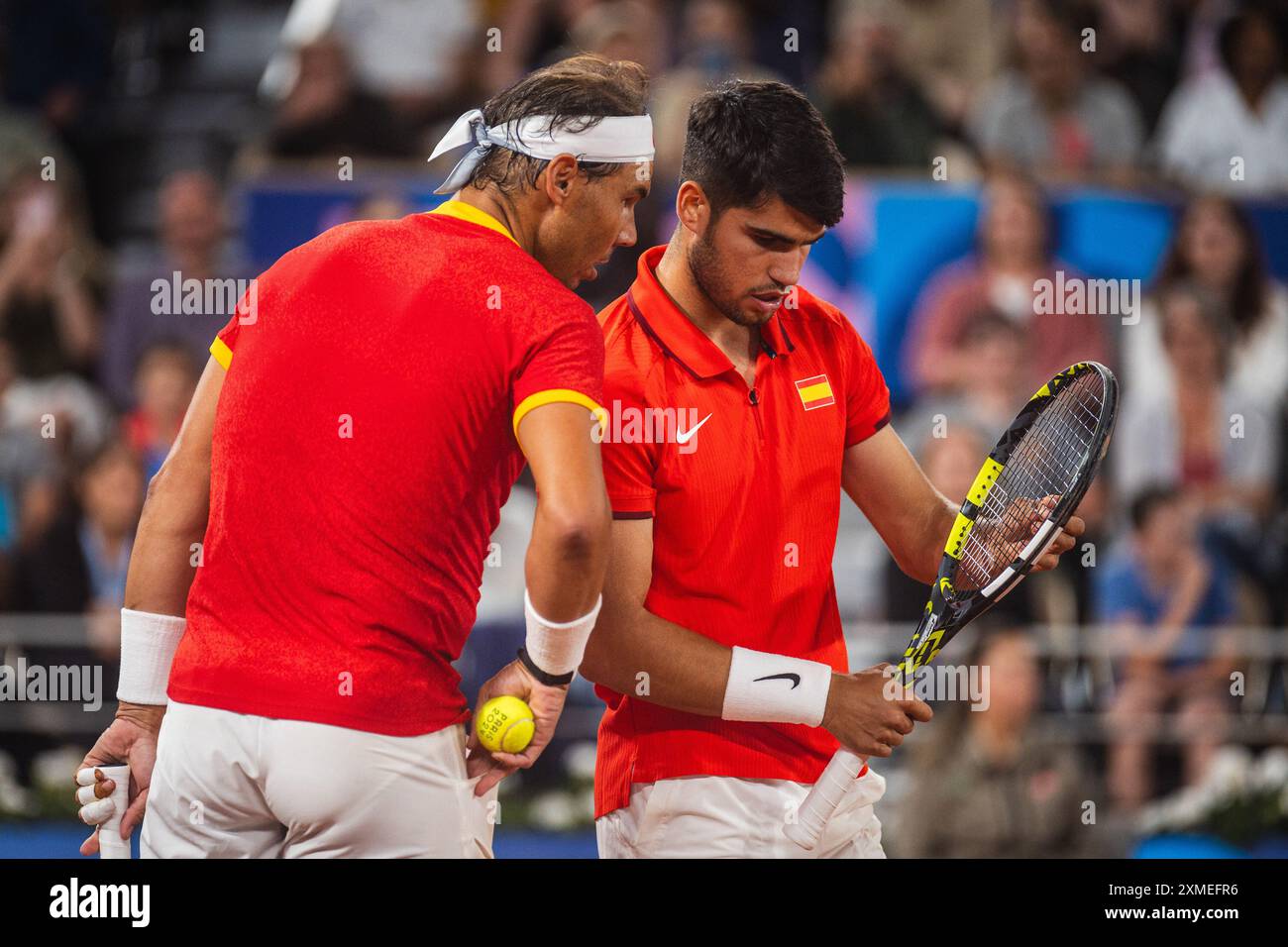 PARIS, IF - 27.07.2024: NADAL X ALCARAZ PARIS 2024 - Tennis Doppel - Paris Olympische Spiele 2024 - Spanien (Alcaraz und Nadal) Frankreich, diesen Samstag (27). Das Spiel ist eine historische Zusammenarbeit zwischen dem aktuellen Weltmeister Alcaraz und dem mehrmaligen Roland-Garros-Champion und ehemaligen Weltmeister Nadal. (Foto: Luca Castro/Fotoarena) Stockfoto