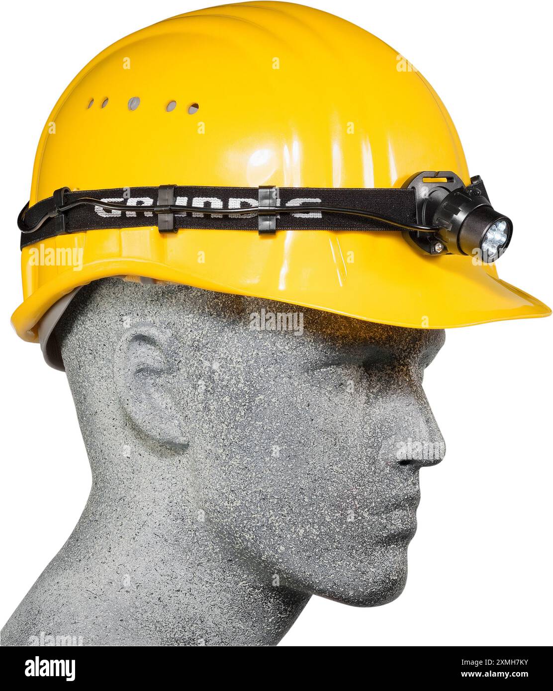 Gelber Schutzhelm mit Scheinwerfer an einer Schaufensterpuppe Stockfoto