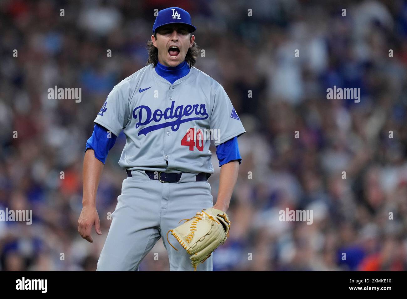 Los Angeles Dodgers relief pitcher Brent Honeywell celebrates after a baseball game against the Houston Astros, Sunday, July 28, 2024, in Houston. (AP Photo/Kevin M. Cox) Stockfoto