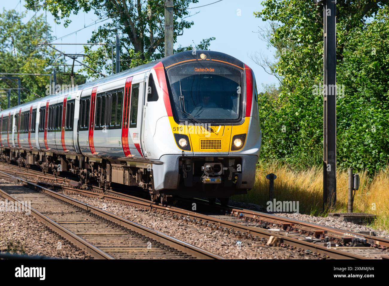 Greater Anglia British Rail Class 720 Aventra Zug von Greater Anglia durch Margaretting in Richtung Clacton on Sea, UK. Moderne Eisenbahn Stockfoto