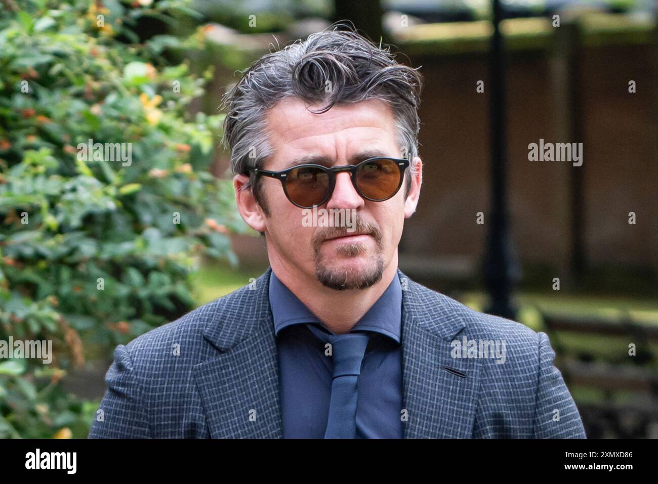 Joey Barton kommt im Warrington Combined Crown and Magistrates Court Centre an, wo er wegen böswilliger Kommunikationsdelikte beschuldigt wird. Die Anklage betrifft Tweets, die er über den Fußballexperten Eni Aluko während eines FA-Cup-Spiels schickte, das sie für die BBC im Januar kommentierte. Bilddatum: Dienstag, 30. Juli 2024. Stockfoto