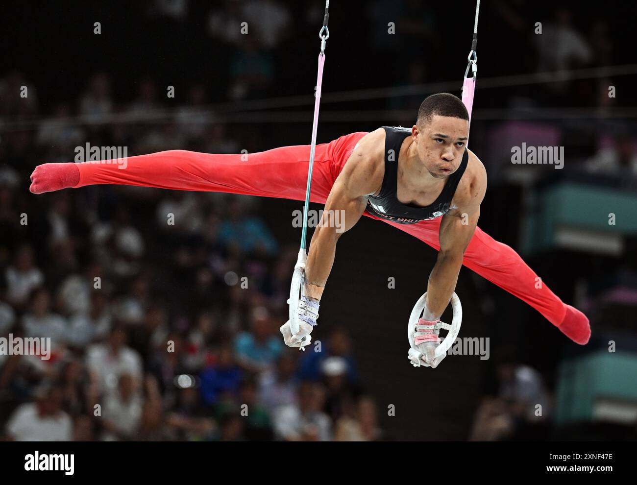 Paris, Frankreich. 31. Juli 2024. Joe Fraser aus Großbritannien tritt an den Ringen des All-Around-Endspiels der Herren im Kunstturnen bei den Olympischen Spielen 2024 in Paris, Frankreich, am 31. Juli 2024 an. Quelle: Cheng Min/Xinhua/Alamy Live News Stockfoto