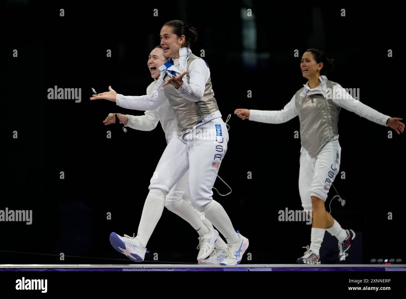 United States' fencers Lee Kiefer, Lauren Scruggs, Jaqueline Dubrovich ...