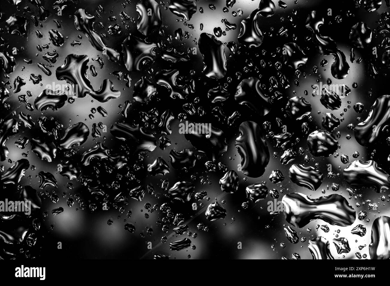 Nahaufnahme von schwarzen und weißen Wassertropfen auf Glas, die ein dramatisches und stimmungsvolles abstraktes Muster erzeugen. Vorlage für Hintergründe, Texturen und Kunstwerke Stockfoto