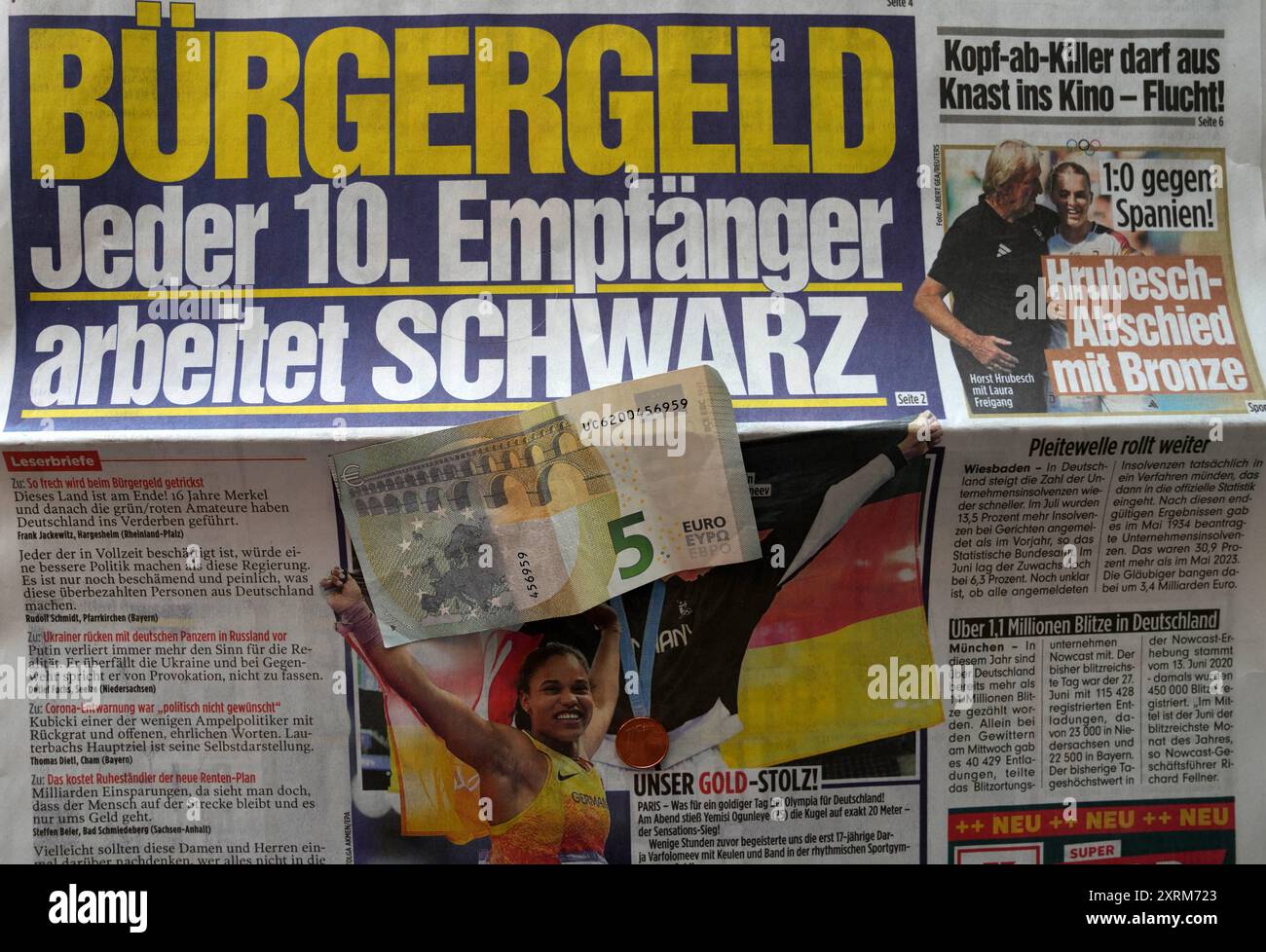 Bürgergeld DDR,20240810, Symbolbild, Ausschnitt Bild Zeitung, Bürgergeldbezieher arbeiten schwarz *** Bürgergeld DDR,20240810, Symbolbild, Auszug aus Bild, Bürgergeldempfänger arbeiten illegal Stockfoto