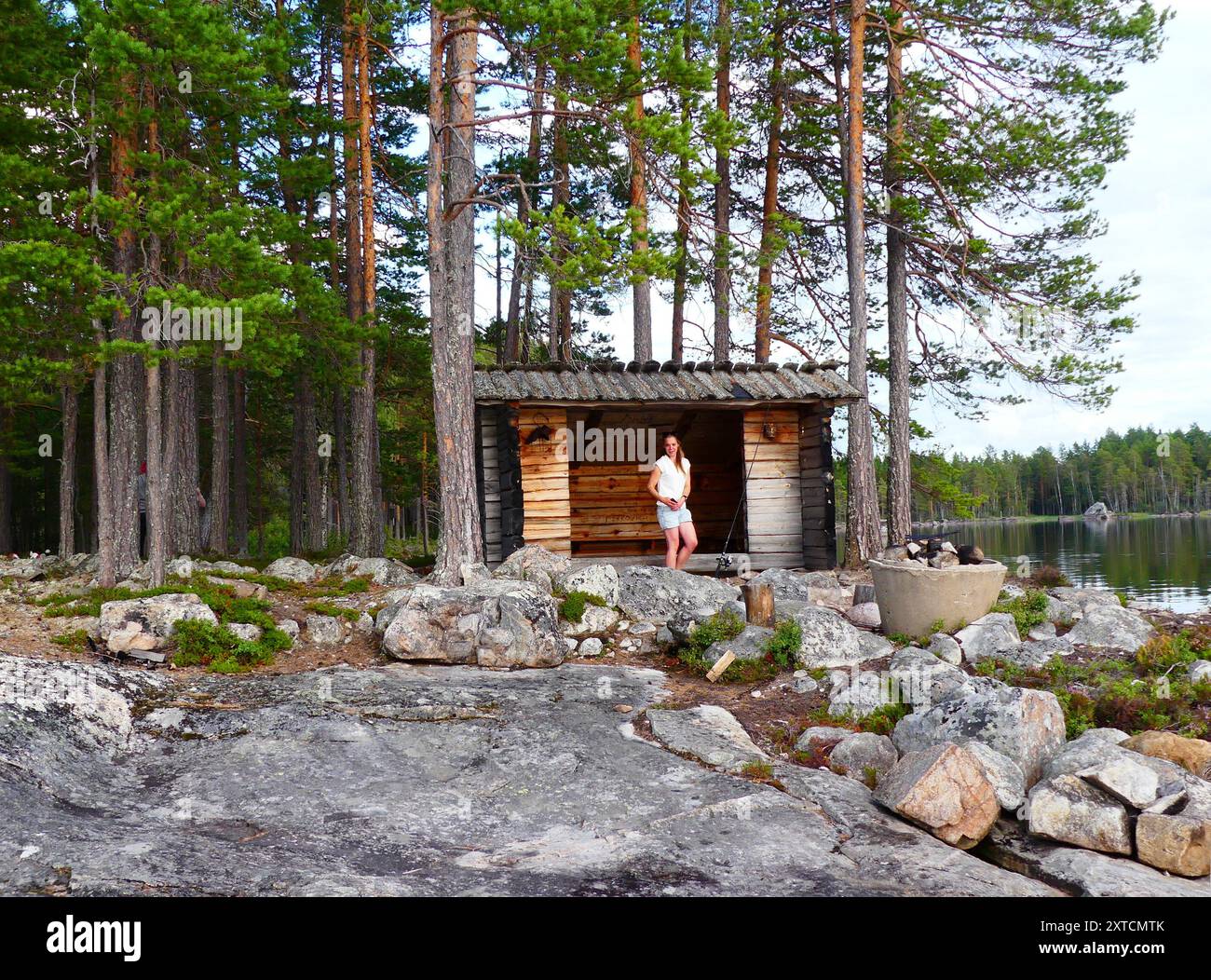 Frau am Windschutz Stockfoto