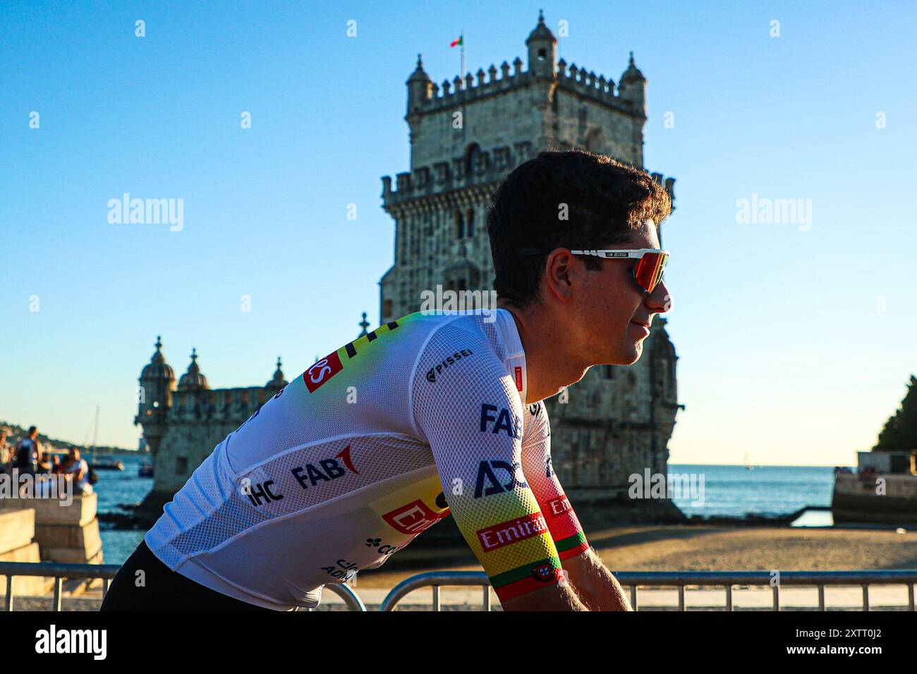 Belem, Portugal. August 2024. Joao Almeida aus Portugal vom Team Emirates aus den Vereinigten Arabischen Emiraten während der Teampräsentation im Torre de Belem vor dem 79. La Vuelta Ciclista a Espana 2024. Quelle: SOPA Images Limited/Alamy Live News Stockfoto