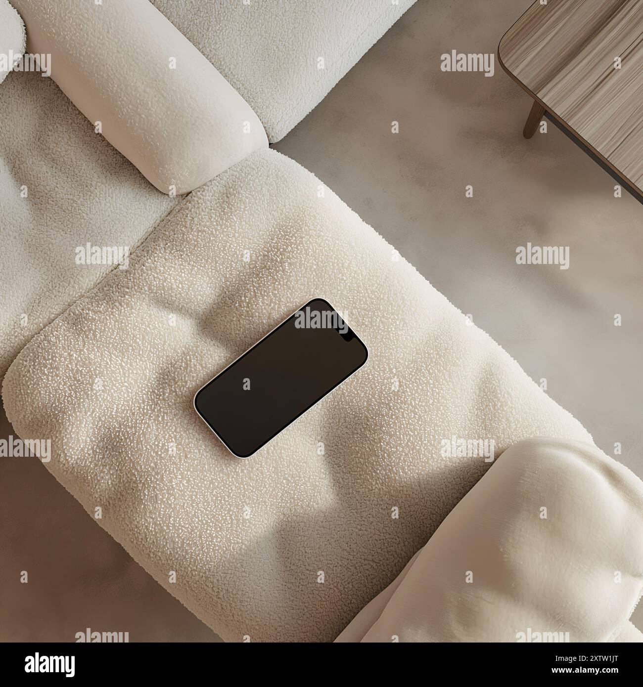 Foto-Modell des Geräts auf Sofa, Textil, Modell, moderner und ästhetischer Stil, Smartphone-Modell beige Ästhetik Stockfoto