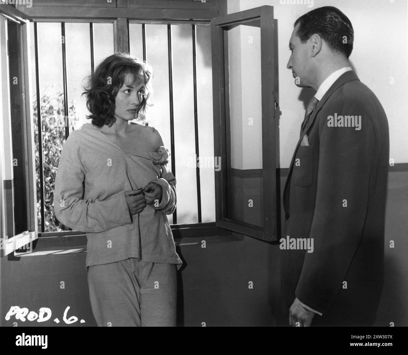 BARBARA SHELLEY und ROBERT AYRES in einer Szene aus CAT GIRL 1957 Regisseur ALFRED SHAUGHNESSEY Drehbuch LOU RUSOFF Insignia Films / Anglo-Amalgamated Film Distributors Stockfoto