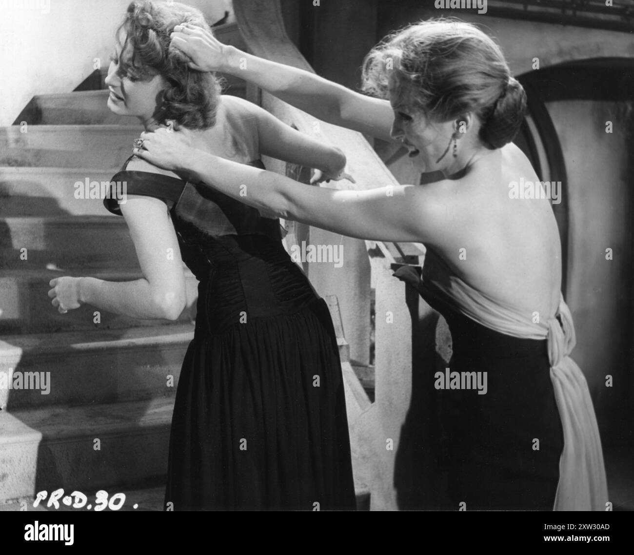 PADDY WEBSTER und BARBARA SHELLEY in einer Szene aus CAT GIRL 1957 Regisseur ALFRED SHAUGHNESSEY Drehbuch LOU RUSOFF Insignia Films / Anglo-Amalgamated Film Distributors Stockfoto