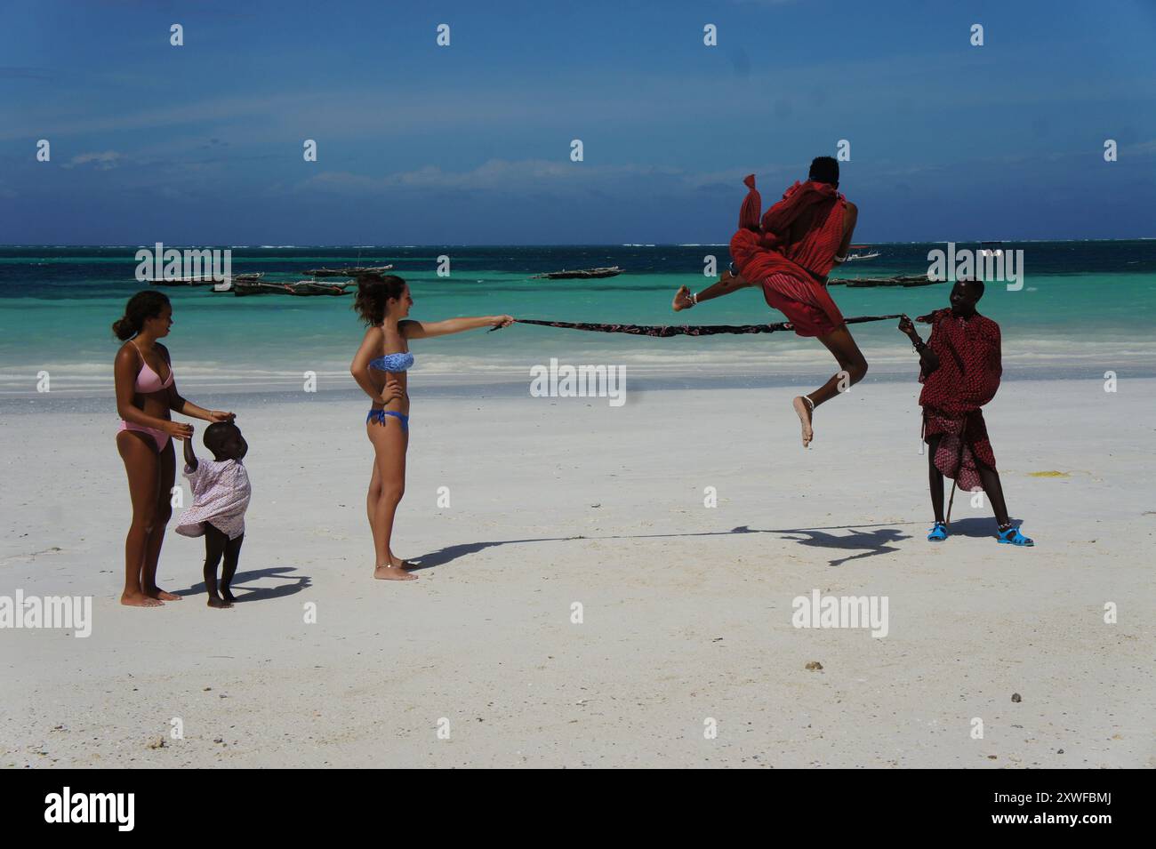 Hochsprung verbindet Menschen Stockfoto