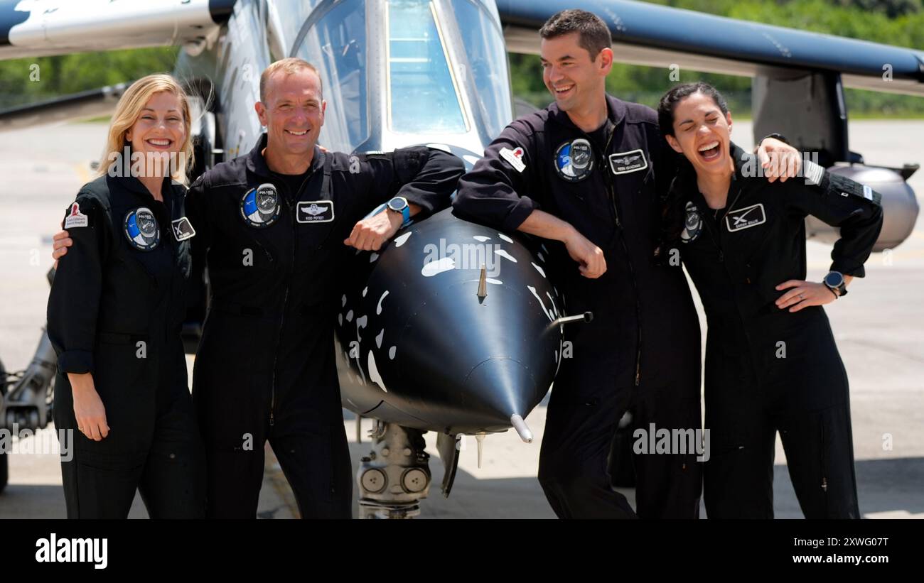 Astronauts from left, mission specialist Anna Menon, pilot Scott Poteet, commander Jared Isaacman and mission specialist Sarah Gillis arrive at the Kennedy Space Center for an upcoming private human spaceflight mission at Cape Canaveral, Fla., Monday, Aug. 19, 2024. (AP Photo/John Raoux) Stockfoto