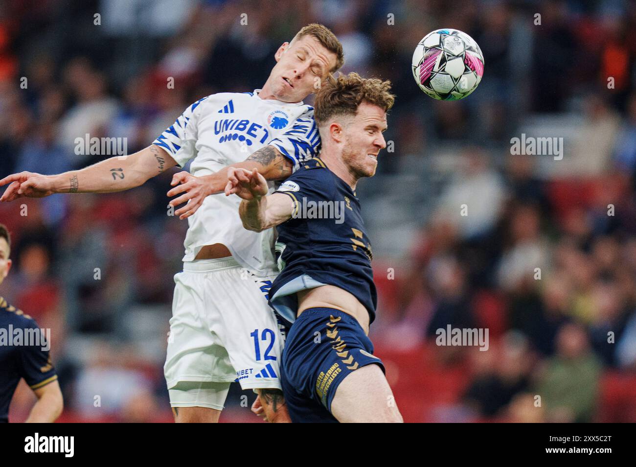 Kopenhagen, Dänemark. August 2024. FCK-Spieler Lukas Lerager und Kilmarnock FC-Trainer Marley Watkins während des Qualifikationsspiels der Conference League zwischen dem FC Kopenhagen und Kilmarnock FC am Donnerstag, den 22. August 2024 in Kopenhagen. (Foto: Liselotte Sabroe/Ritzau Scanpix) Credit: Ritzau/Alamy Live News Stockfoto