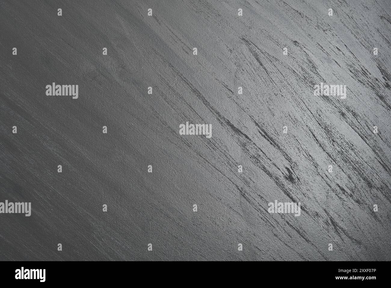 Sapphire Metallic Sahara Wandbeschichtung mit strukturiertem Farbmuster grau-schwarze dekorative Beschichtung Stockfoto