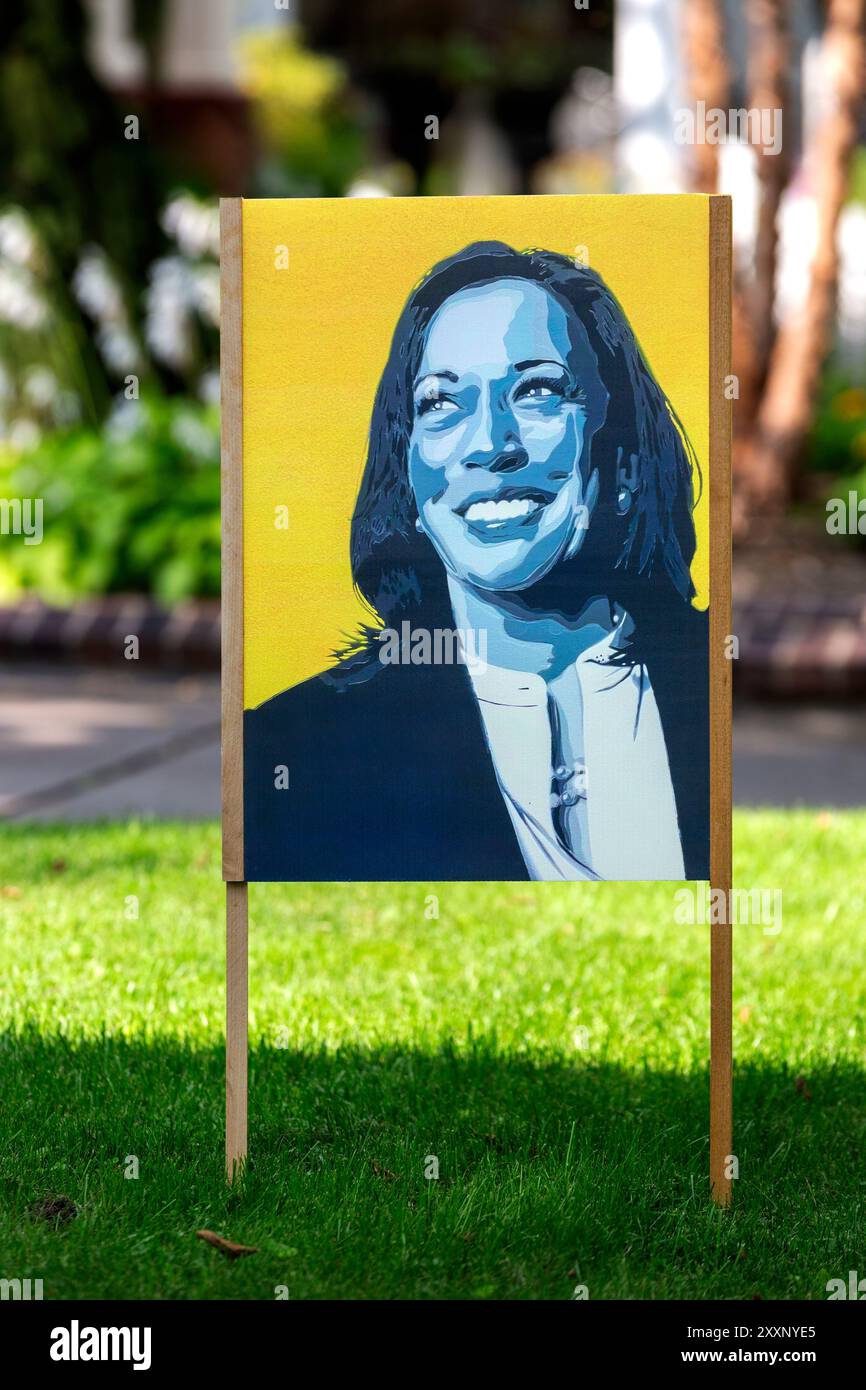 2024 Schild für die US-Präsidentschaftswahl mit einem Porträt-Gemälde, das Vizepräsidentin Kamala Harris darstellt Stockfoto