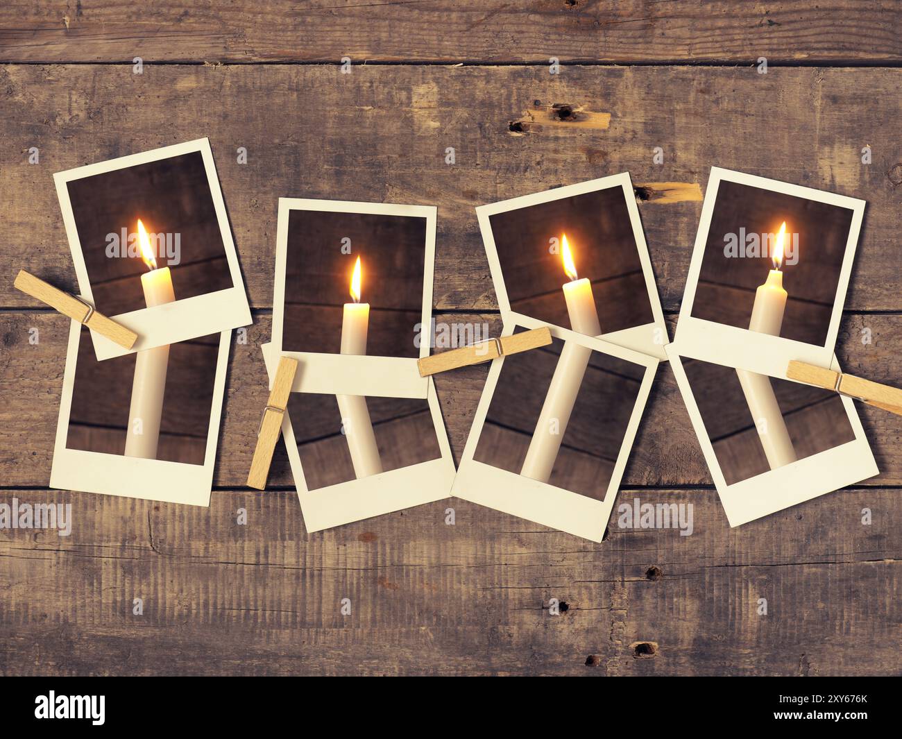 Altes instant Foto mit vier Kerzen auf einem rustikalen hölzernen Hintergrund, Advent Konzept Hintergrund stilisierte Retro-film Stockfoto