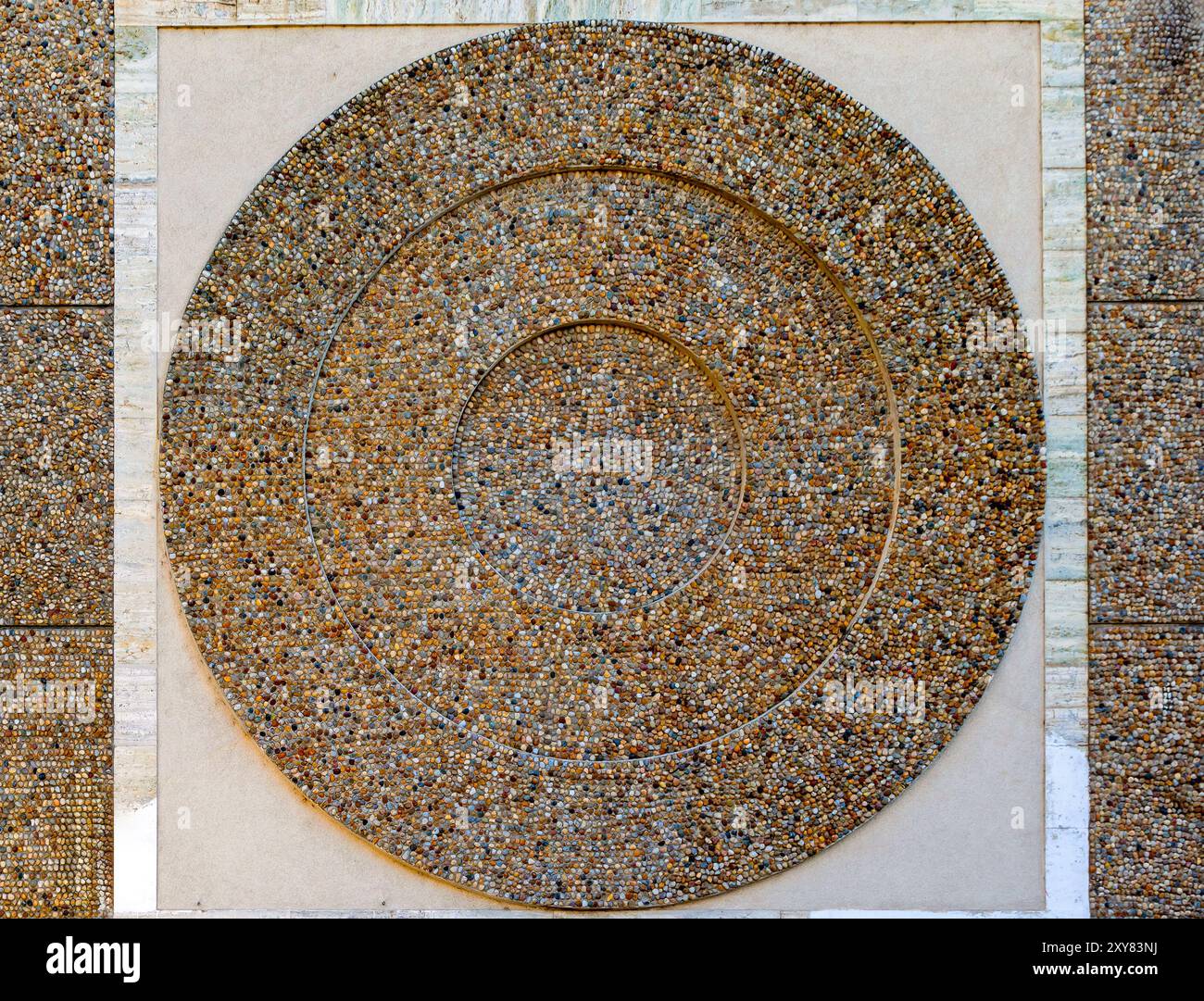 Steine Kieselmuster Materialbeschaffenheit von Natursteinen in Kreisform Stockfoto