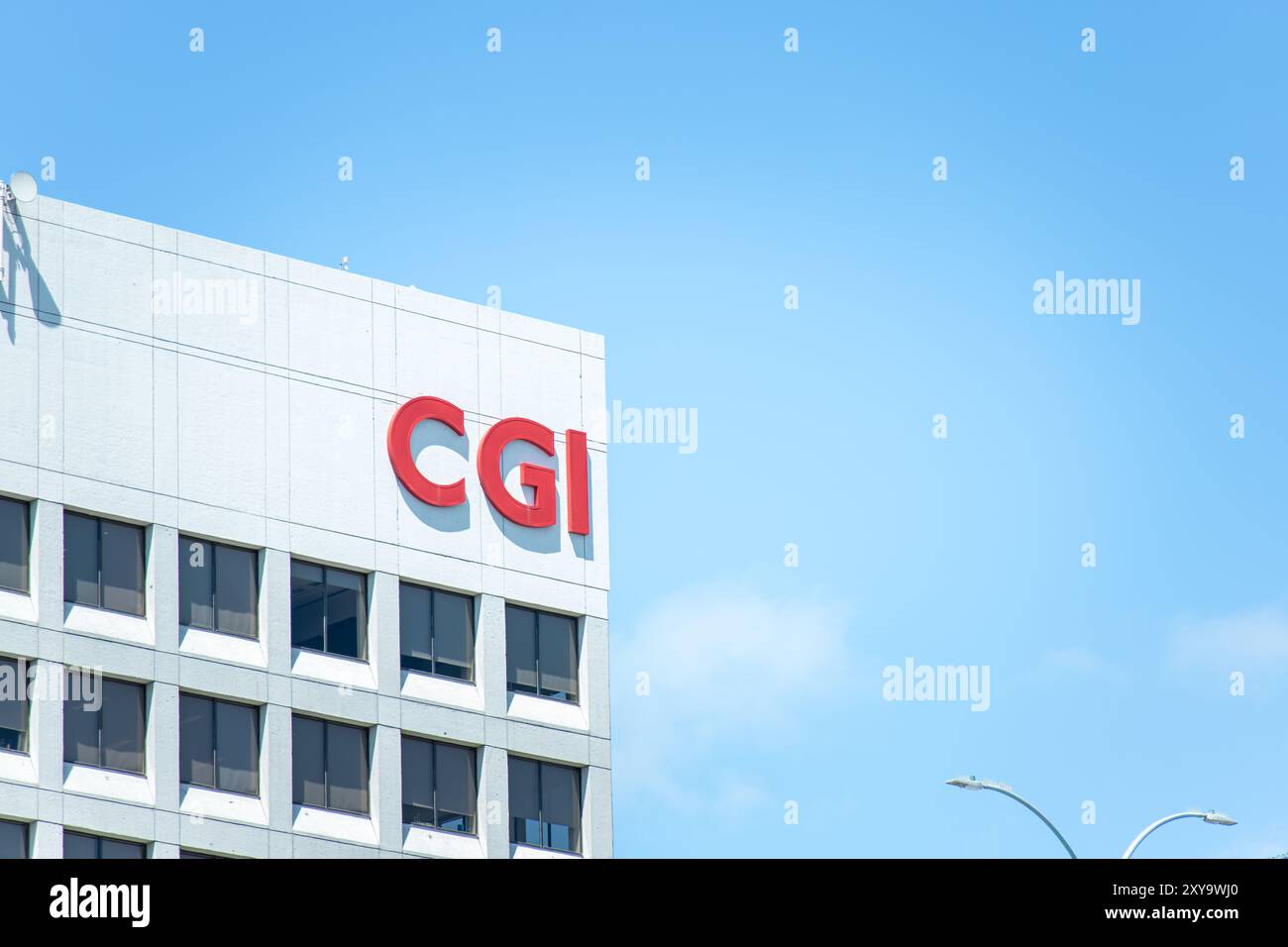 Ein Bauzeichen von CGI an einem sonnigen Tag. CGI Inc. Ist ein kanadisches Unternehmen, das IT-Beratung, Systemintegration und Outsourcing-Dienstleistungen anbietet. Stockfoto