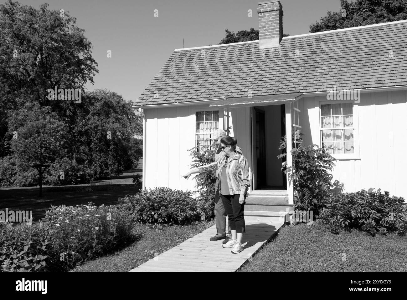 Kaukasisches Paar, 60 bis 65 Jahre alt, besucht Herbert Hoover Geburtsort und National Historic Site in West Branch, Iowa, USA. Stockfoto