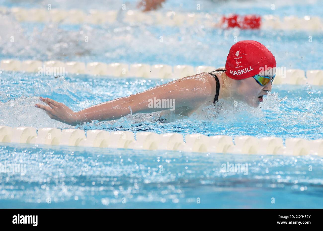 Paris, Frankreich. August 2024. Poppy Maskill vom Team Großbritannien, das am ersten Tag der Paralympischen Spiele 2024 in Paris, Frankreich, an der Para Swimming 14 100 Fly teilnimmt. Quelle: Isabel Infantes/Alamy Live News Stockfoto