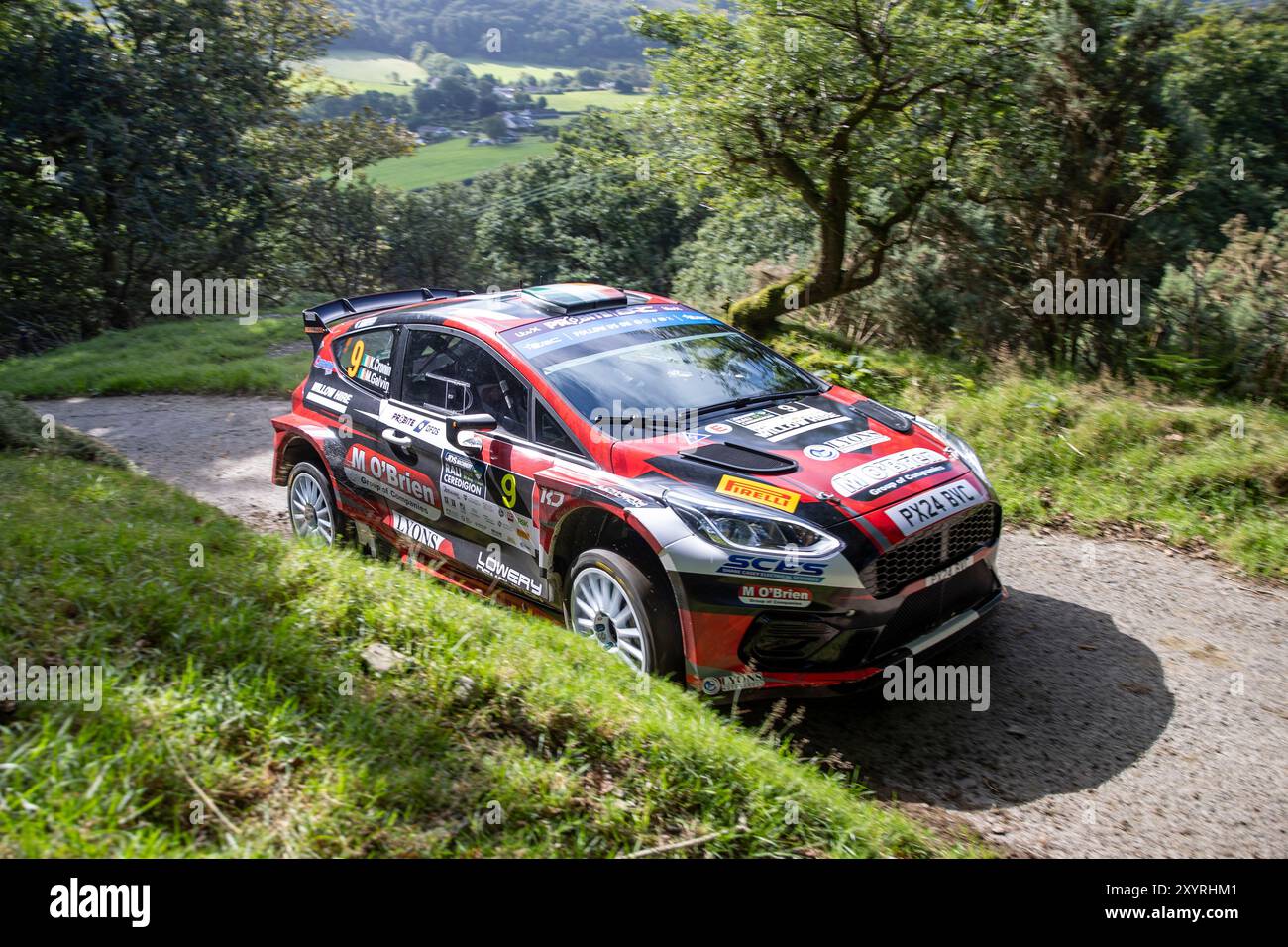 Aberystwyth, Dyfed, Großbritannien. 30. August 2024. 2024 FIA European Rally Championship Day 1; Fahrer Keith Cronin und Beifahrer Mikie Galvin in ihrem Ford Fiesta Mk II während der Rallye Shakedown Credit: Action Plus Sports/Alamy Live News Stockfoto