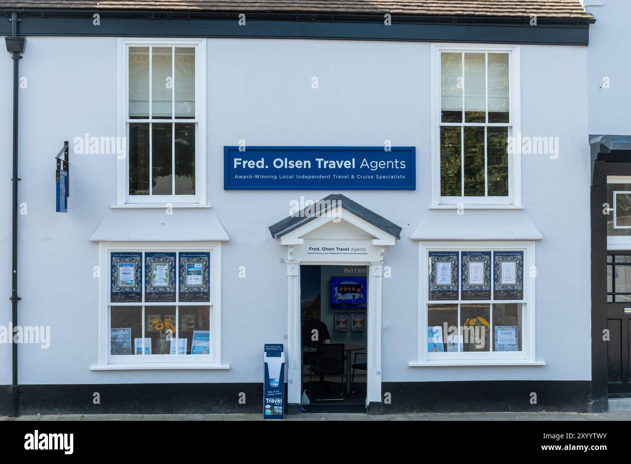 Fred Olsen Travel Agents in Ringwood, Hampshire, England, Großbritannien. Kreuzfahrten Kreuzfahrtschiffe Urlaub Stockfoto