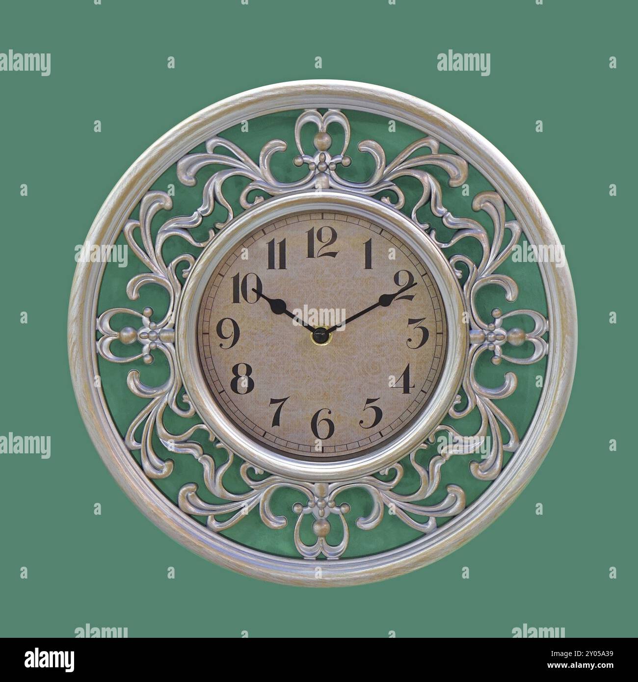 Große Vintage-Uhr an der grünen Wand Stockfoto