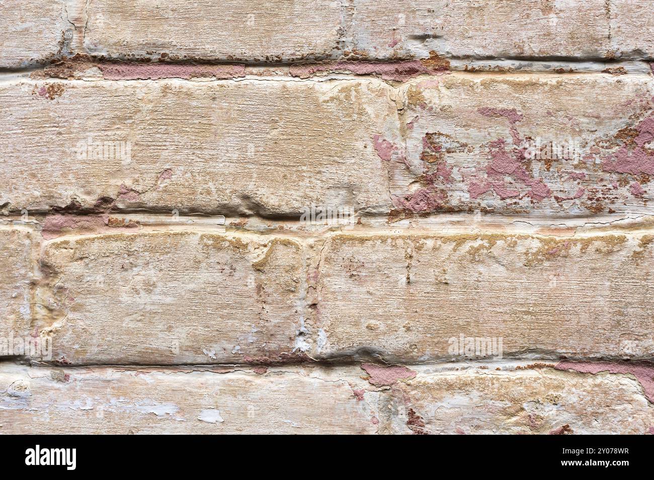 Close-up strukturierten Hintergrund von multi-layer abblätternde Farbe an der Wand. Mischen von verschiedenen Farben von Farben in der gespalten Schichten auf der Oberfläche. Grunge Stockfoto