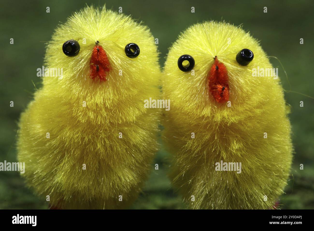 Gelbe Mini-Dekorfiguren Stockfoto