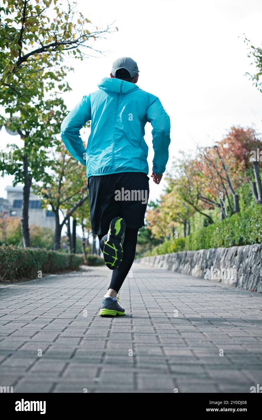 Die hintere Figur des Running man Stockfoto