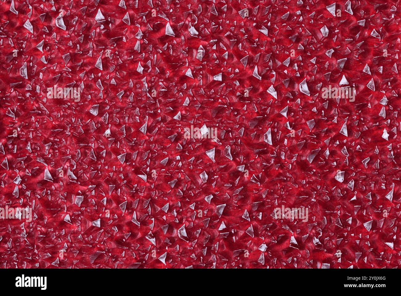 Roter unebener Hintergrund mit Acrylfarbe Stockfoto