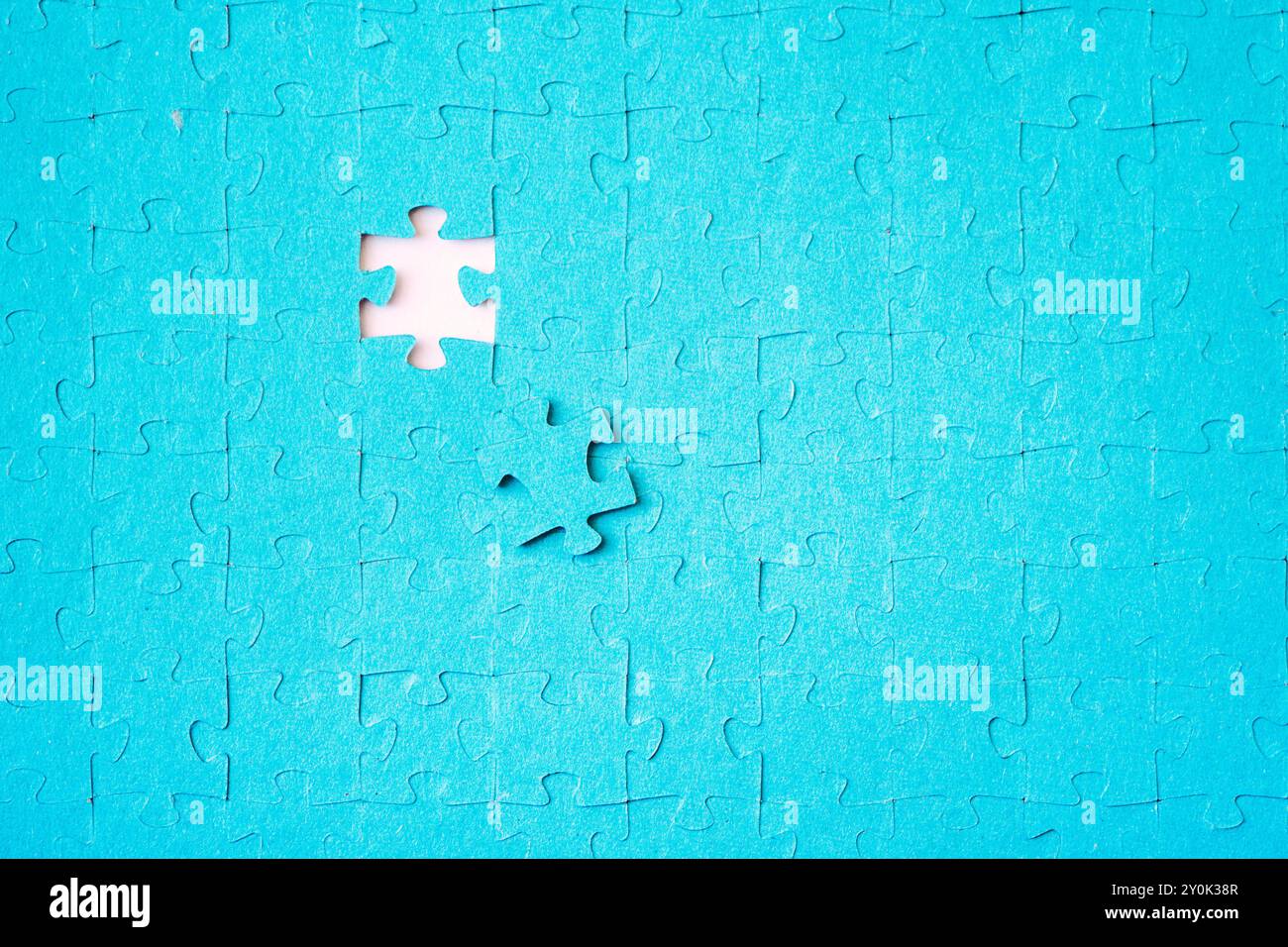 Fehlende Puzzleteile. Geschäftskonzept. Abschließende Aufgabe wird verrechnet. Das Puzzle ist zusammengebaut Stockfoto