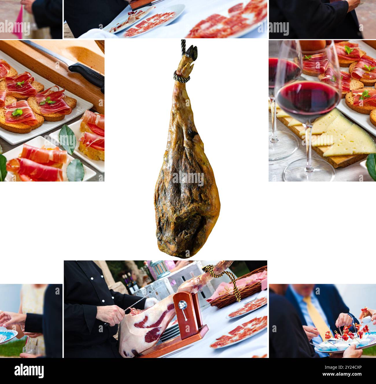 Komposition oder Design von Vorspeisen aus iberischem Schinken mit einem Glas Wein, Reifen Tomaten und Kuhkäse auf weißem Holzhintergrund. Spanische Vorspeisen. Stockfoto