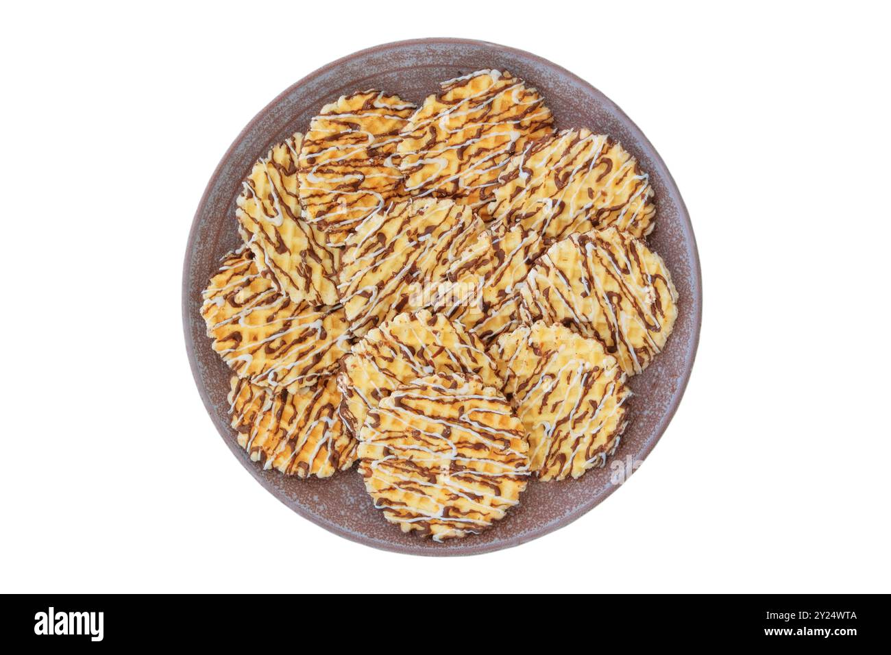 Verschiedene Waffeln auf Keramikplatte. Waffeln mit Schokoladenüberzug. Belgisches Dessert. Isolieren auf weißem Hintergrund. Draufsicht. Stockfoto