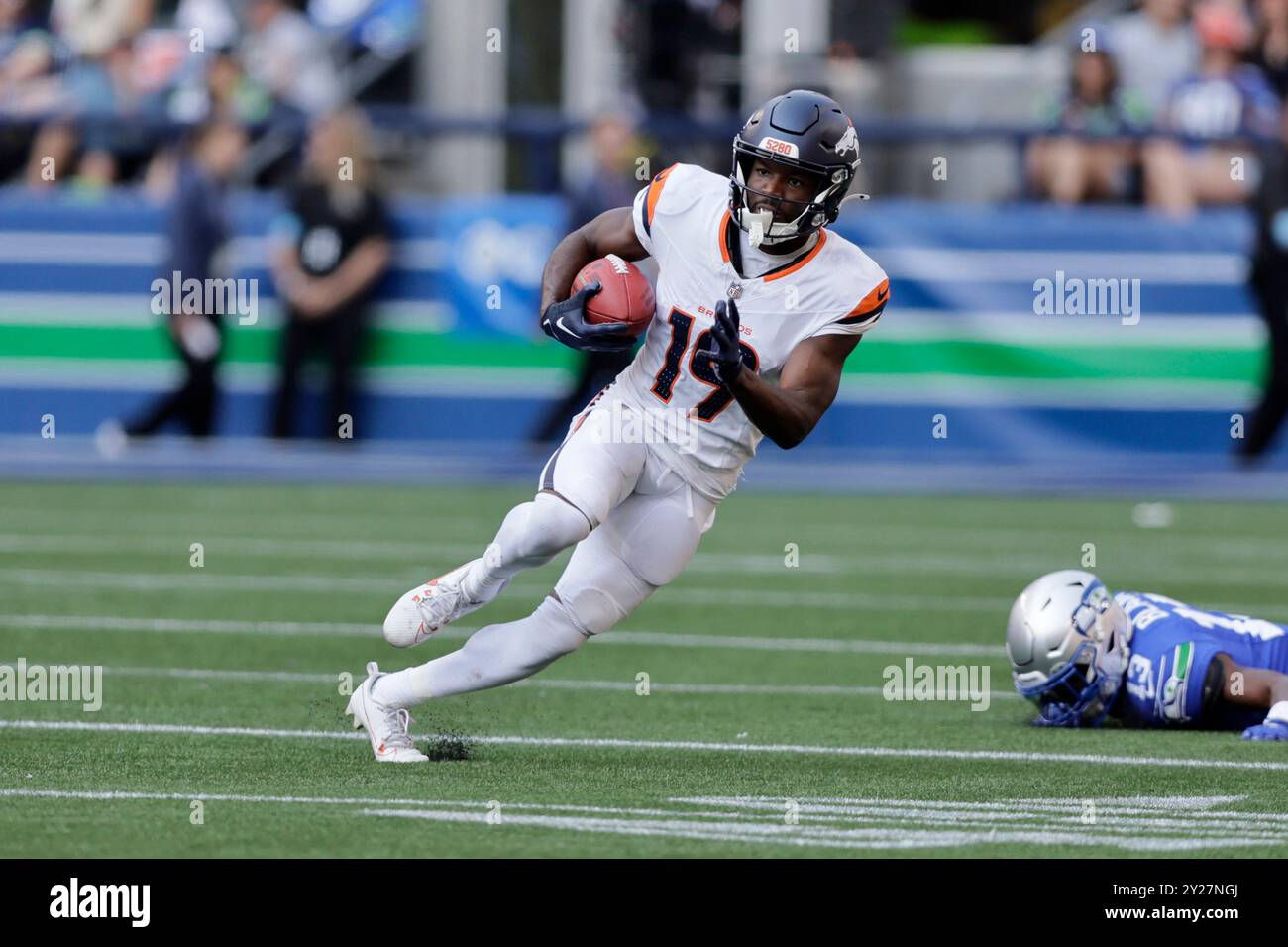 Denver Broncos wide receiver Marvin Mims Jr. returns a kick against the Seattle Seahawks during the second half of an NFL football game, Sunday, Sept. 8, 2024, in Seattle. (AP Photo/John Froschauer) Stockfoto