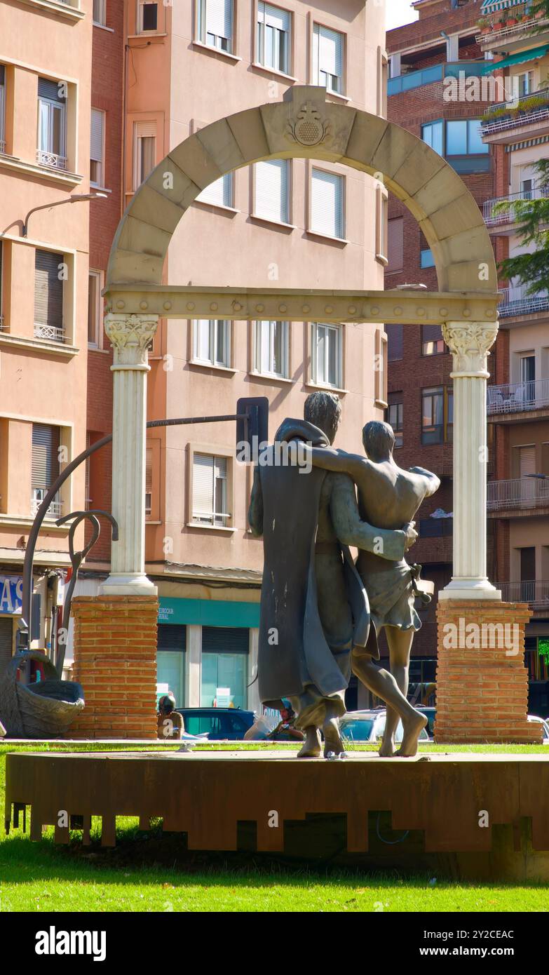 Skulptur des Heiligen Johannes von Gott, der einem Kranken zum 425. Jahrestag der Gründung des Ordens Palencia Castil und Leon Spanien hilft Stockfoto