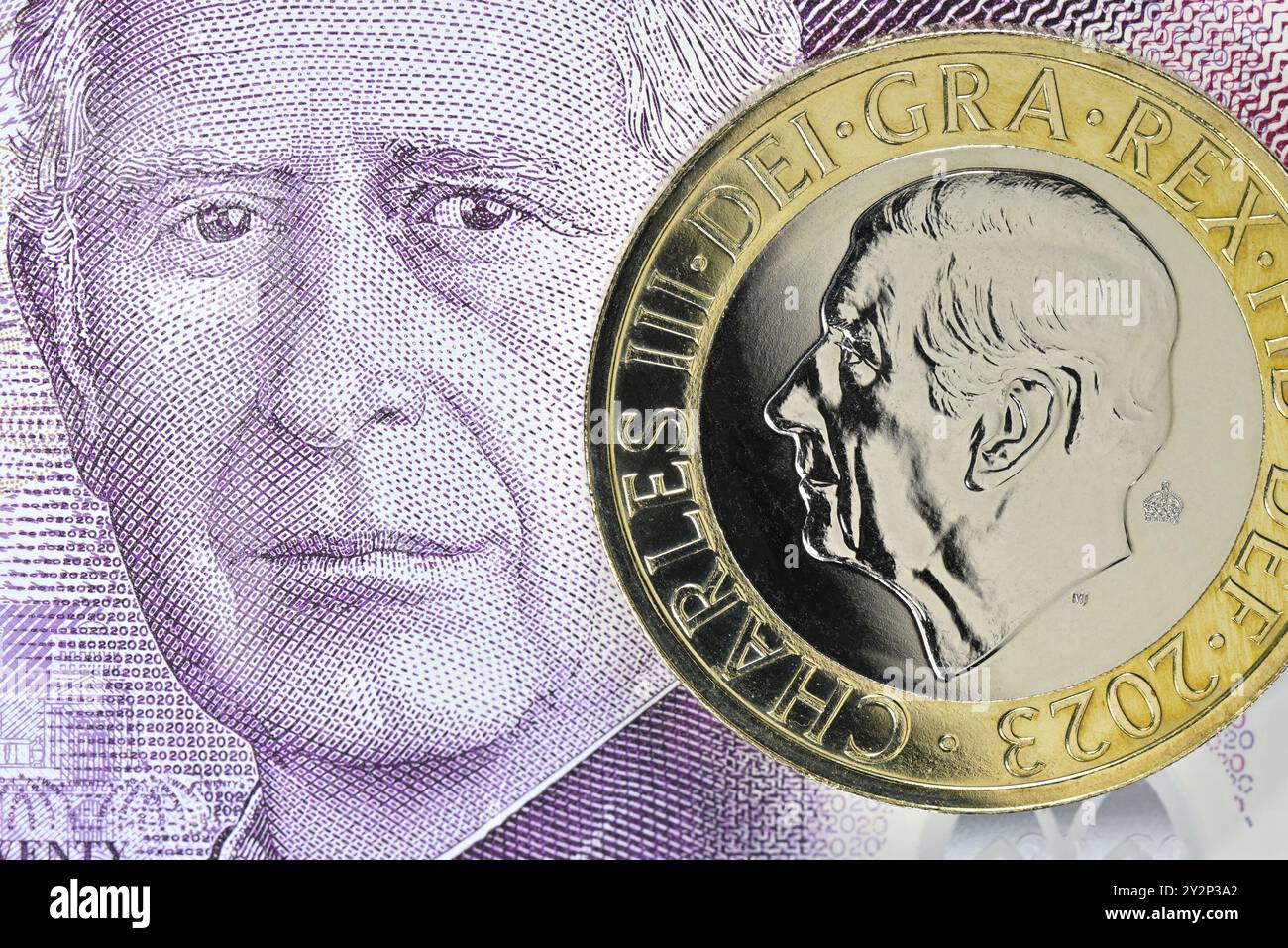 Charles III. Britische Kurenz - 20 £ Schein und 2 £ Münze Stockfoto