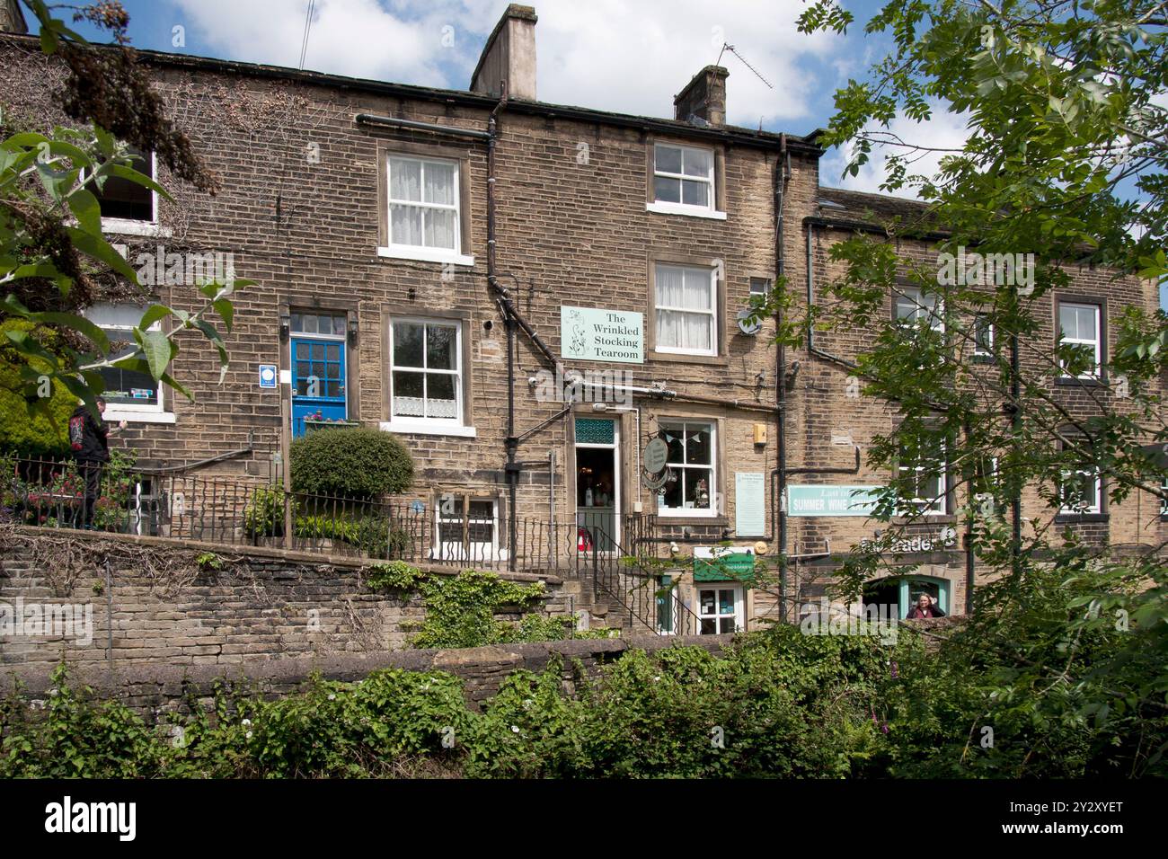 Das Nora Batty Steps und Filmset für die Last of the Summer Wine british Sitcom ist heute das Café und Ausstellungszentrum Wrinkled Stocking in Holmfirth, Yorks Stockfoto