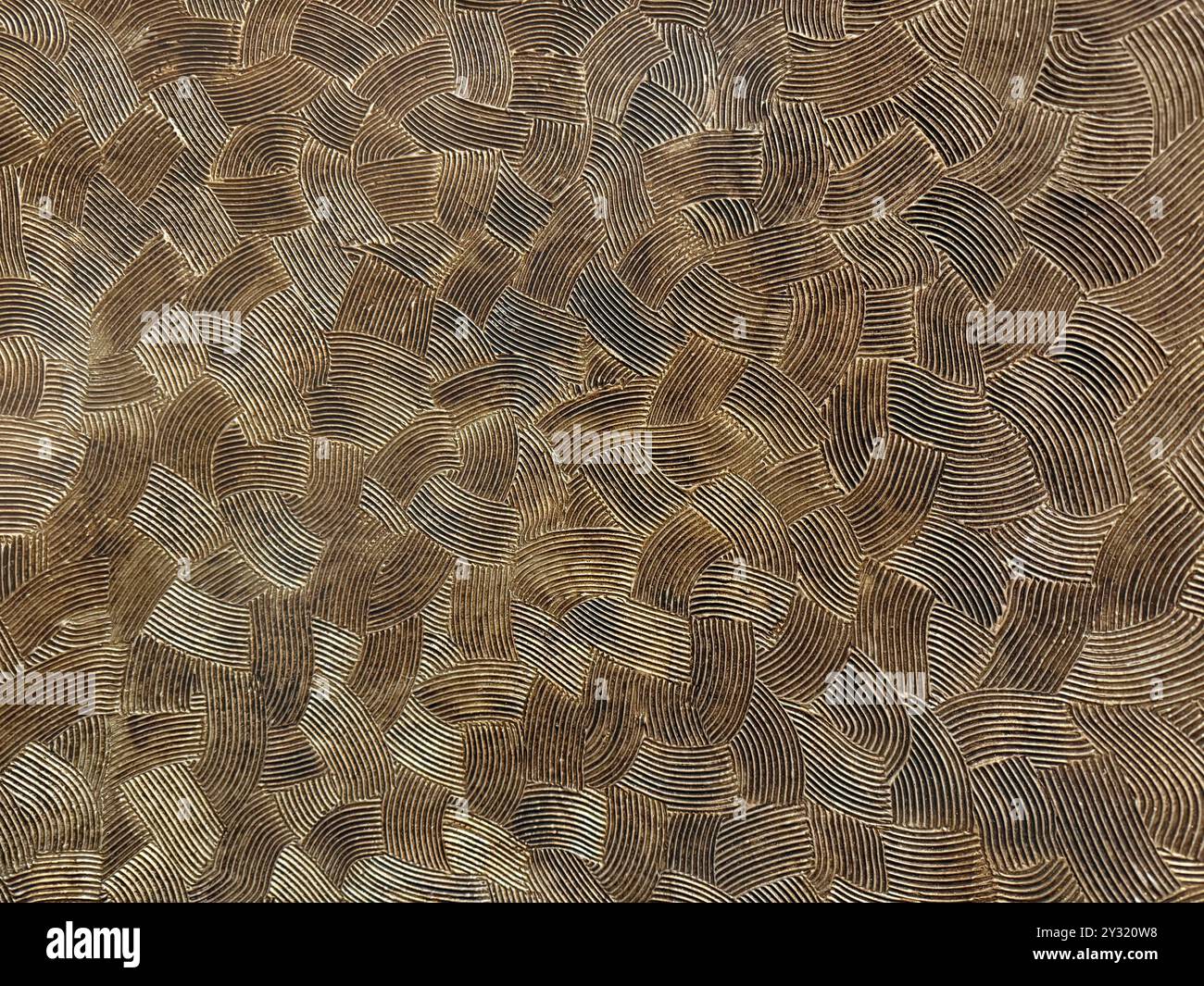 Strukturierte gewaschene Farbe in Braun- und Goldfarbe. Fingerabdruckmuster, nahtlos, keine Leute. Stockfoto