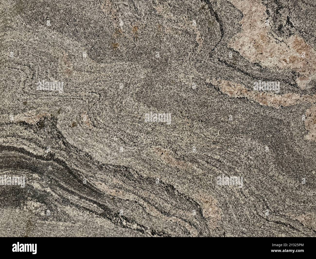 Nahaufnahme Textur von Natursteingranit-Plattenmuster in marmoraussehenden Adern und Körnern, nahtlose Textur Stockfoto