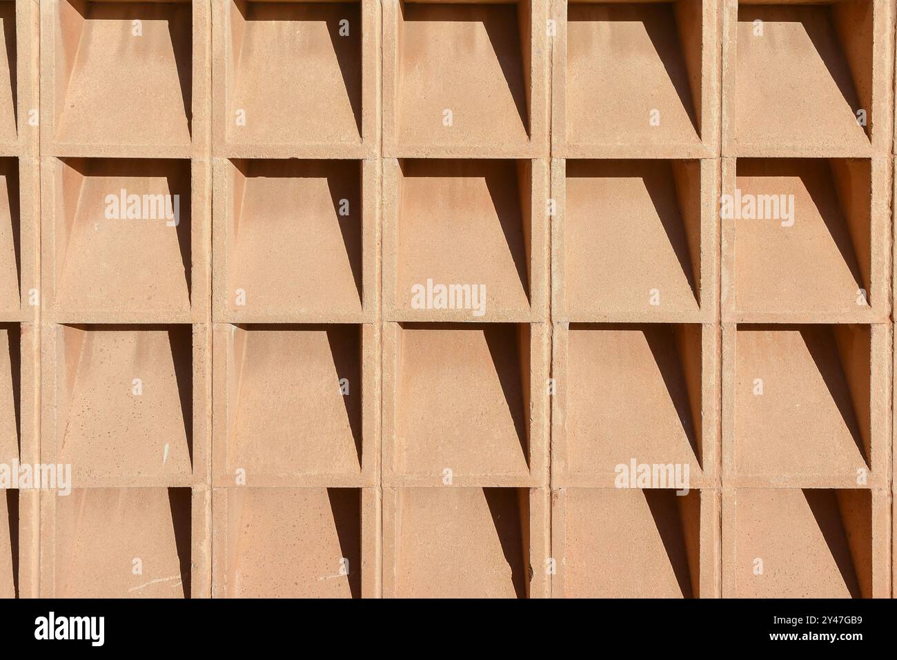 Nahaufnahme einer Wand aus Tonfliesen, geeignet für Hintergrund, Textur, Muster usw. Stockfoto