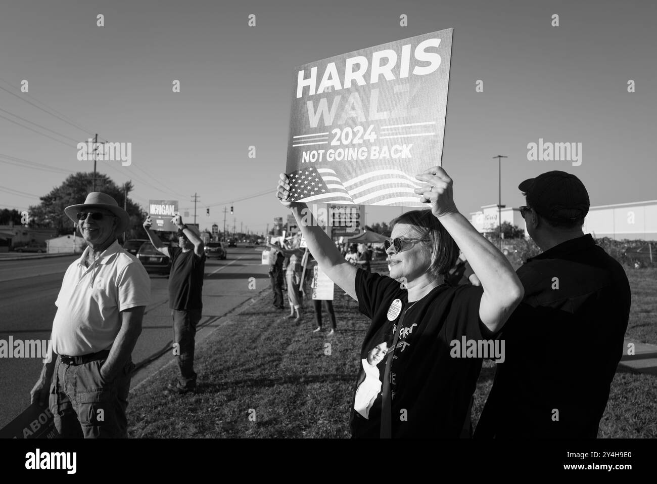 Demonstranten beim Positivitätsprotest der Demokratischen Partei des Genesee County, 17. September 2024 Stockfoto