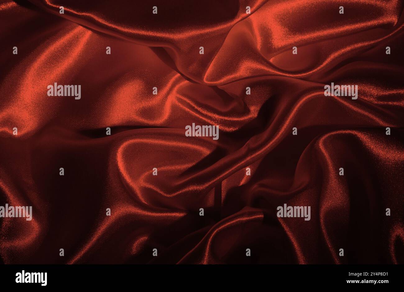Hintergrund und Textur von Seidengewebe in Pfirsichfarbe Stockfoto