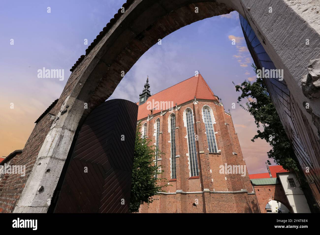 Die Fronleichnamsbasilika im Bezirk Kazimierz in Krakau ist eine gotische Kirche, die von König Kasimir III. Dem Großen gegründet wurde. Stockfoto