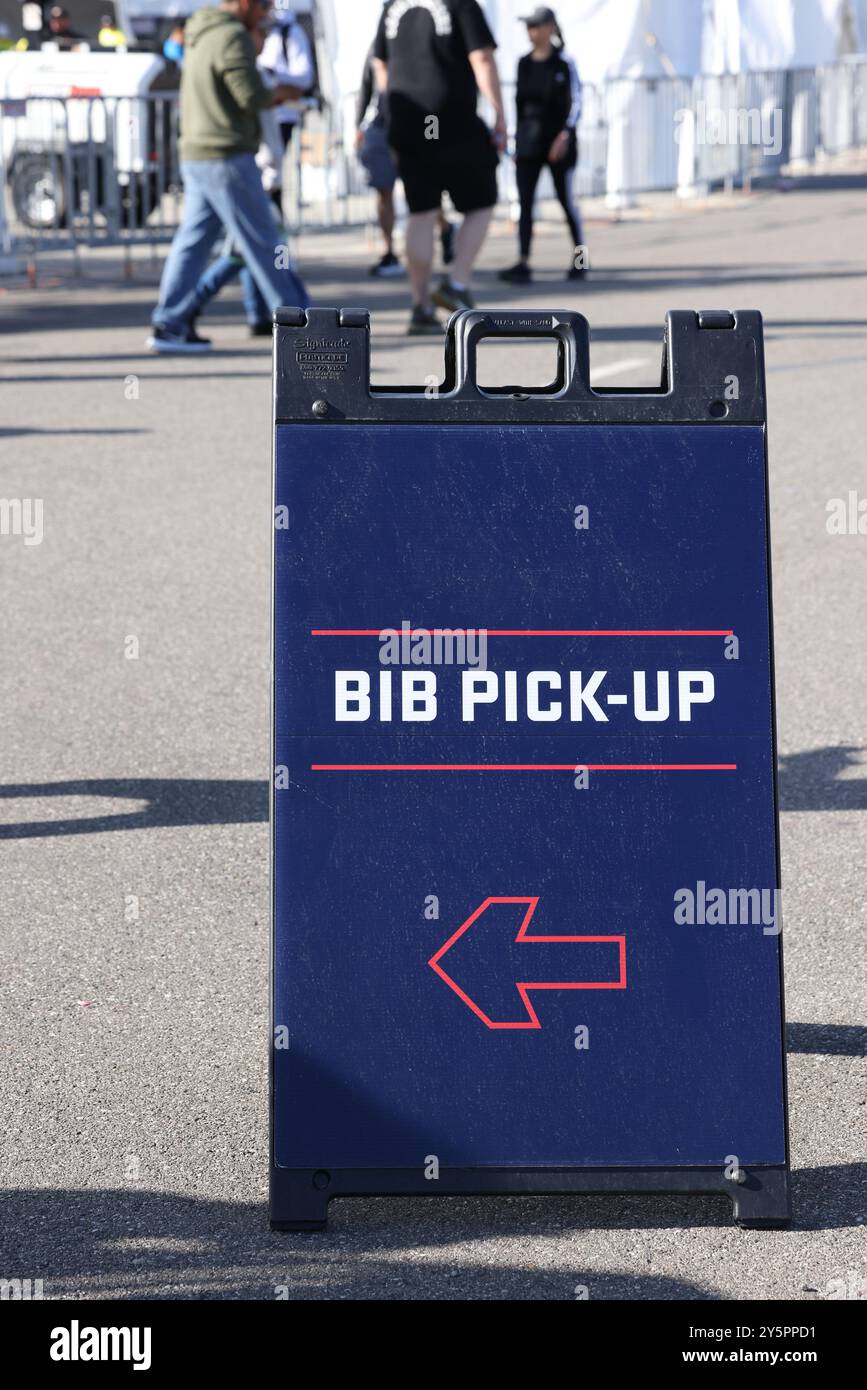 Schild zum Abholen von Lätzchen Stockfoto
