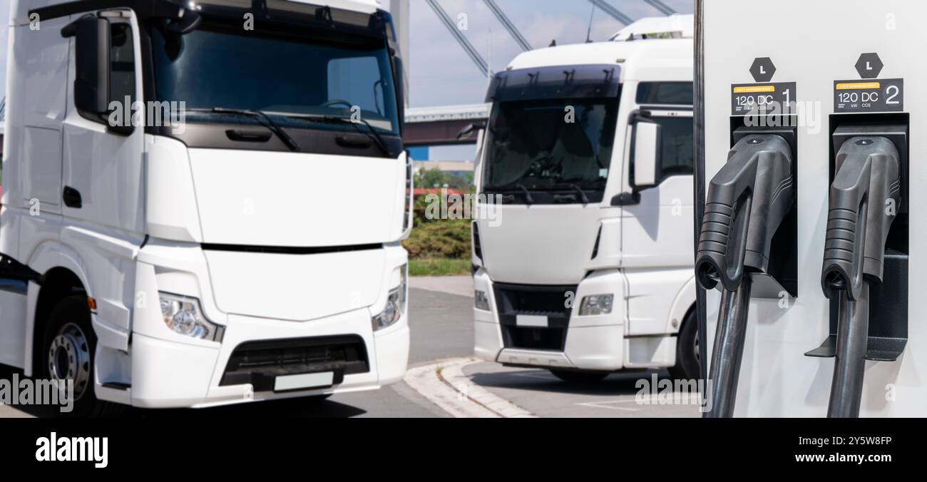Ladestation für Elektrofahrzeuge auf einem Hintergrund eines Lkws. Konzept... Stockfoto