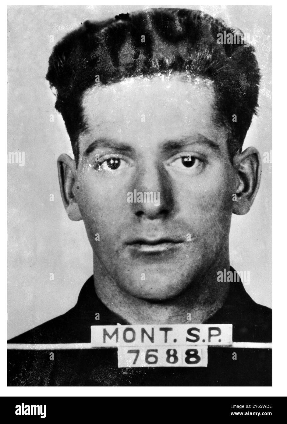 Hier ist William Mahan, ehemaliger Sträfling, der im Zusammenhang mit der Entführung von George Weyerhaeuser aus Tacoma, Washington, am 24. Mai gesucht wird. Mahan soll der Besitzer eines Autos sein, das am 9. Juni in Butte, Montana, beschlagnahmt wurde und 15.155 US-Dollar des Weyerhaeuser-Lösegeldes enthielt. Mahan ist ein Ex-Sträfling. Er wurde von Harmon Wally als einer der Entführer benannt, der zusammen mit seiner Frau Margaret in Salt Lake City verhaftet wurde. Wally und seine Frau haben laut Polizei gestanden, dass sie in den Entführungsfall involviert sind. 11. Juni 1935 Stockfoto